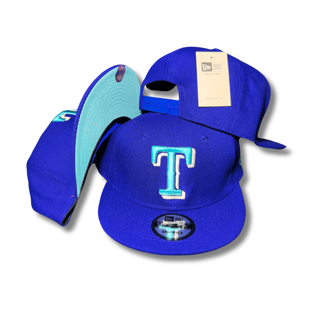 Texas Rangers New Era 9FIFTY with Aqua Underbill Royal Blue Snapback Cap
