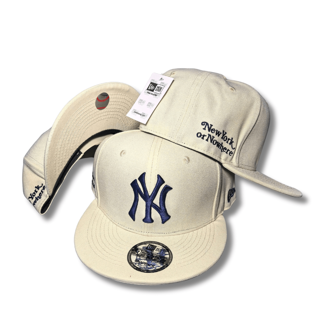 New York Yankees with Navy Embroidered Logo and "New York or Nowhere" Script Cream Snapback Cap