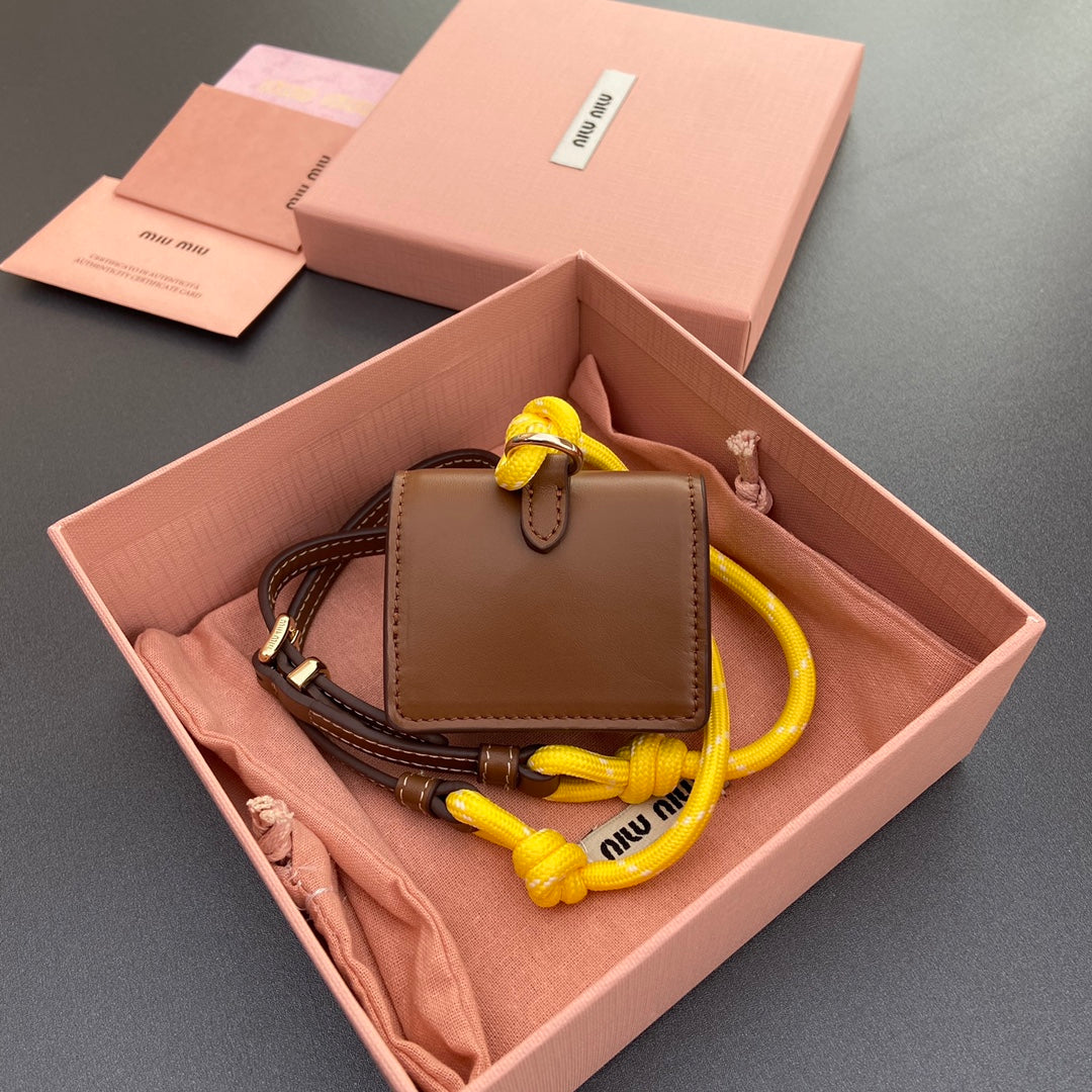 MICRO BAG 7 IN TAWNY BROWN SMOOTH LAMBSKIN YELLOW STRAP